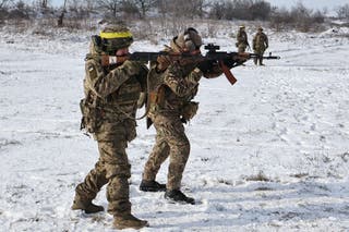 Ukrainian recruits perform drills at a training ground in the Zaporizhzhia region on Wednesday